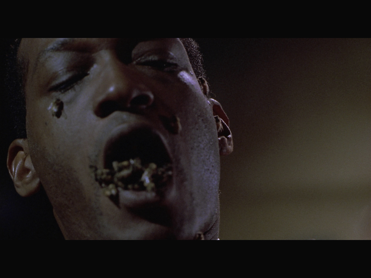 Candyman with bees coming out of his mouth.